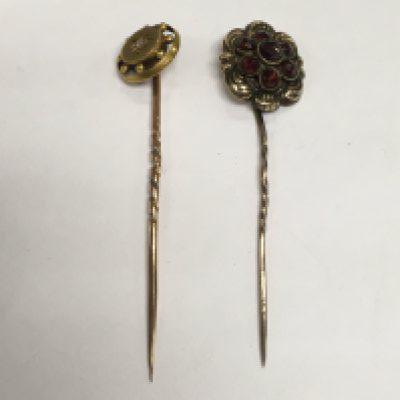Two gold stick pins, one marked 15ct, approx total weight 2.6g. Shipping category A.