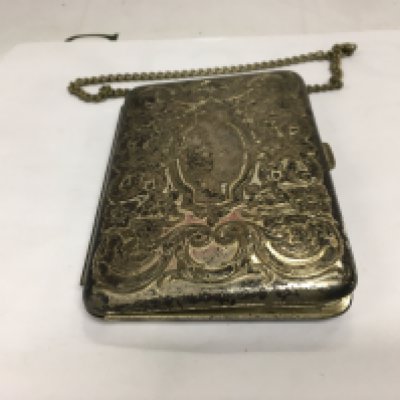 A vintage purse with fittings for a compact, coins etc. Shipping category A.