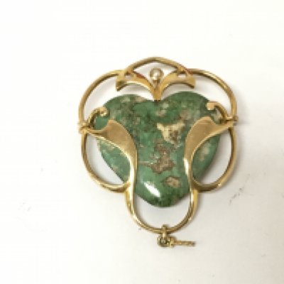 An art nouveau yellow metal and turquoise brooch with a seed Pearl. 7.63g