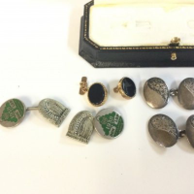 Two pairs of silver cufflinks including a Pair of Dunlop tyres 50 years cuffs and one part 9 carat gold cufflinks , 3.3G total weight. Postage category A NO RESERVE