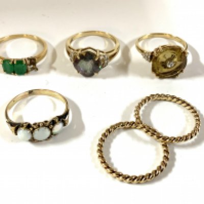 A small collection of 9ct gold and stone set rings. (A)