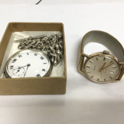 A gents Garrard watch and a silver cased pocket watch and chain (2). Shipping category A.