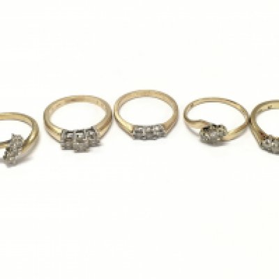 9ct gold rings set with diamond and Moissanite stones . Sizes around M. 10.5g total weight. postage category A