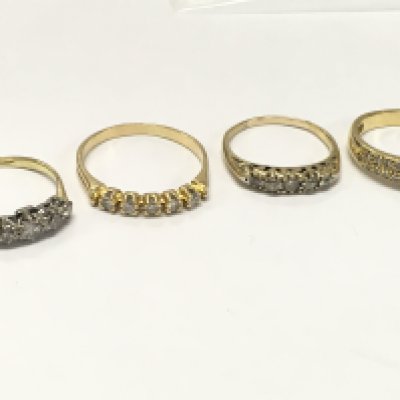Four High carat gold Moissanite set rings. Sizes K, Q etc . 10g total weight. Postage category A