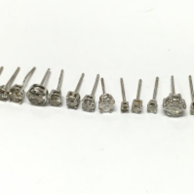 18ct White gold earrings , no sets or butterflys. Set with diamonds and Moissanite. 5.8g total weight. Postage category A