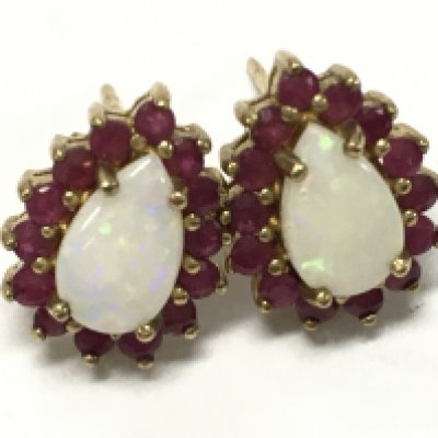 9 carat Gold ruby and Opal set earrings , no butterflies . 1.9g total weight, Postage category A