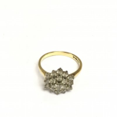 A 9ct gold diamond cluster ring, approx 3.7g and approx size N. Shipping category A.