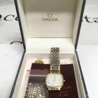 A boxed Omega watch with paperwork. Shipping category B.