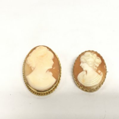 Two 9ct gold cameo brooches, total approx 14.8g. Shipping category A.