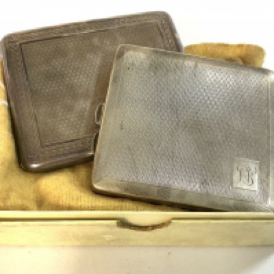 2 heavy hallmarked silver cigarette cases.