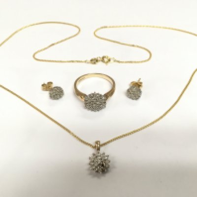 A 9ct gold chip stone diamond ring with a matching pendant and earrings, total approx weight 7g. Shipping category A.