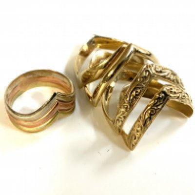 a small collection of 9ct gold wishbone rings.