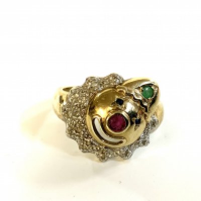 A 9ct gold clown face ring inset with precious stones. R.5 (A)