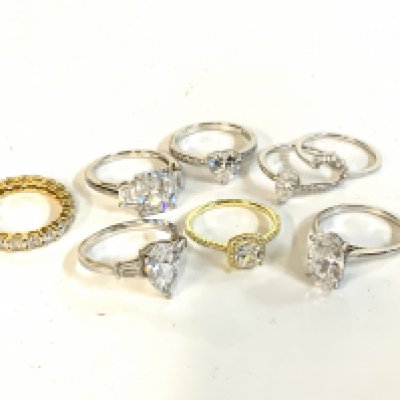 a collection of sterling silver stone set fashion rings. (A)