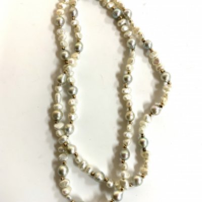 A multicoloured pearl necklace interspersed with gold beads. (A)