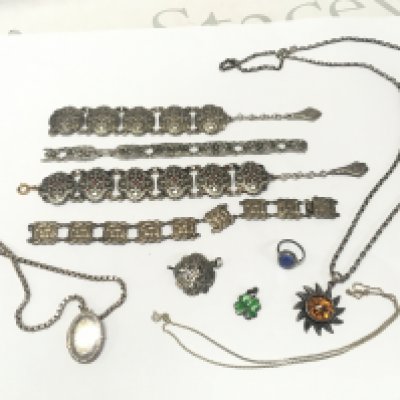 A collection of silver jewellery including bracelets, necklaces, pendants, a ring etc . Postage cat A