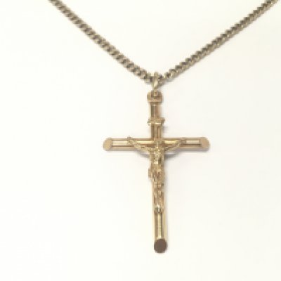 A 9ct gold crucifix and chain. 12.89g approximately.