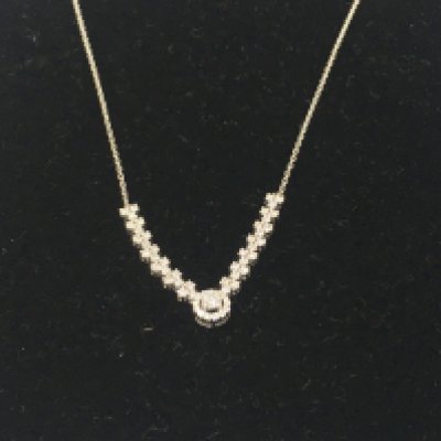 A 14ct white gold diamond necklace. Approximately 3.40g