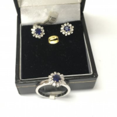 A 14ct white gold diamond and sapphire ring with matching earrings. Size M