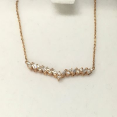 14ct rose gold diamond v necklace. Postage B