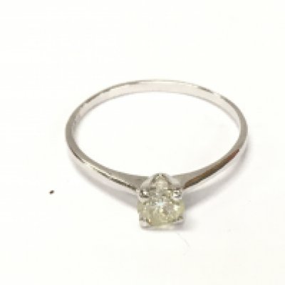 14ct white gold diamond solitaire ring. Size N approximately 0.90g and 0.34ct