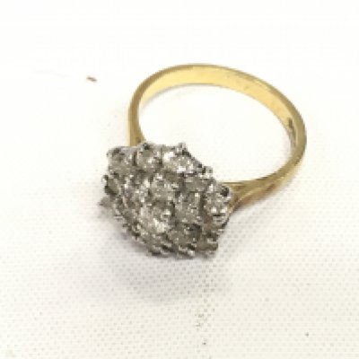 A. 18ct gold diamond cluster ring. Approx weight 5.58 grams, size O.