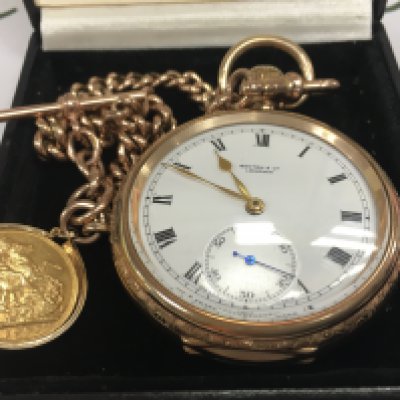 A 9ct gold Benton & Co London pocket watch button wind, with an attached 9ct gold Albert chain and full 1902 sovereign,