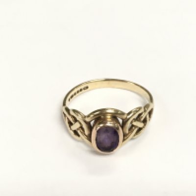 A 9ct welsh gold ring set with a central amethyst, approx 2.7g and approx size M-N. Shipping category A.