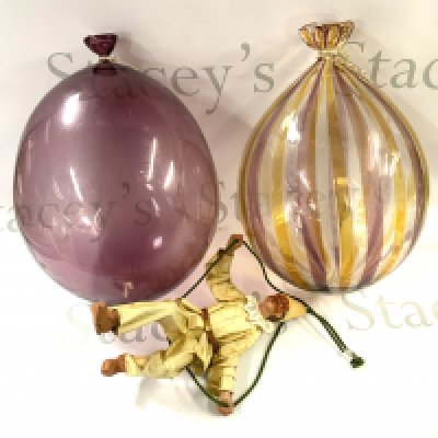 Livio de Marchi, 2 hanging glass balloons with a suspended figure of a clown (both ballloons signed Livio De Marchi for Mare Seguso Vizo Murano. each approximately 13.5&rdquo;. (D)