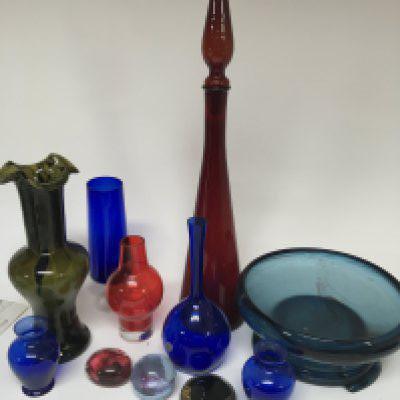 A collection of coloured mid 20th century art glass including a cloud glass bowl.