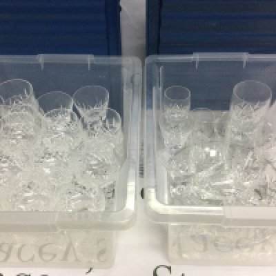 Three boxes of crystal glassware comprising Waterford and Stuart examples. Shipping category D.
