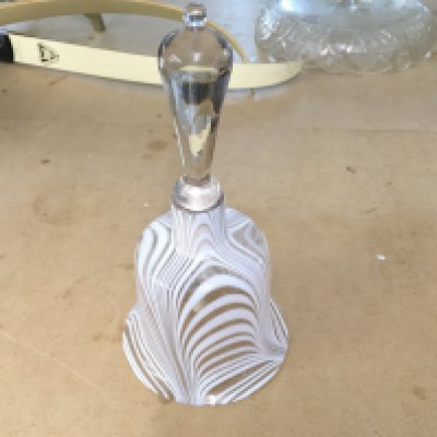 An opaque glass bell.