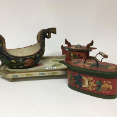 A Norwegian folk art hand painted early 20th century Kasa a tray and two other shaped storage boxes
