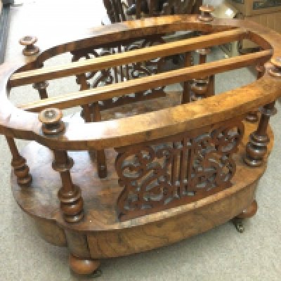 A Victorian walnut canterbury. Shipping category D.