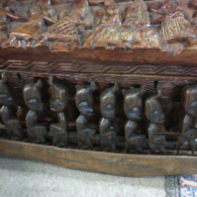 Two Small carved Boxes and a carving in the form of figures on a boat .