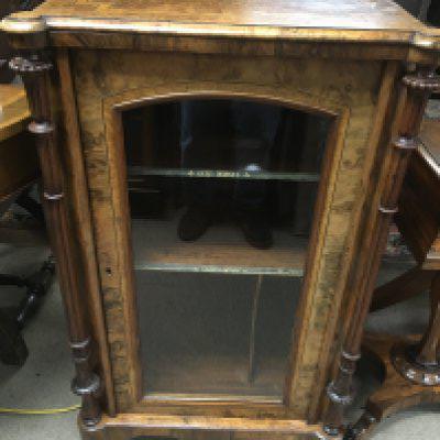 A Victorian inlaid walnut music cabinet.