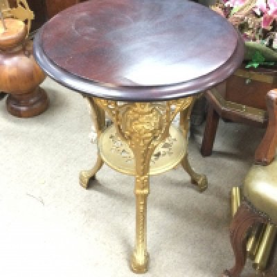 A Victorian cast metal gilt pub table. 58cm diameter 70cm tall.