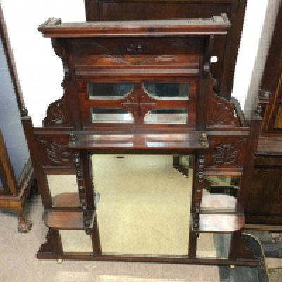 An Edwardian over mantle mirror. 115cm tall 92cm wide.