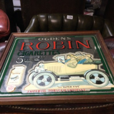 An Ogdens mirror adverting sign. 46x42cm.