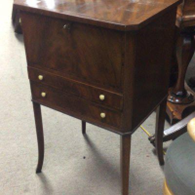 A Mahogany work box with a hinged lid above two drawers sold with contents. Hight 69cm