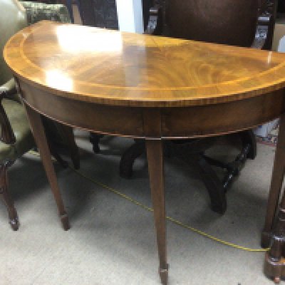 A George III design mahogany console table with inlaid mahogany top on square tapered legs. Good condition length 113cm.