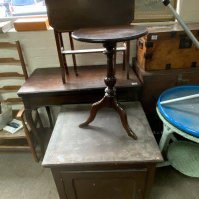 A small Edwardian Pembroke table, tripod table, stained pine utility cabinet, tolle ware standard lamp, ladder back armchair.