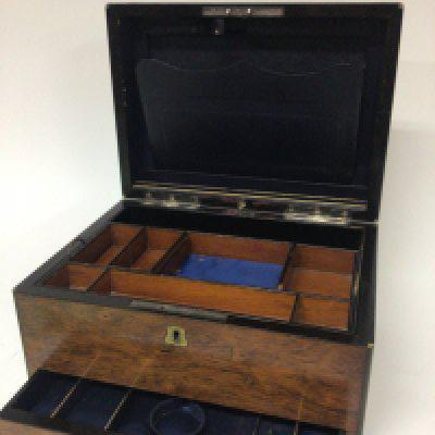 A quality late Victorian rosewood travelling box with a well fitted interior and sprung loaded jewellery drawer maker Parkins & Gotto London 31x23cm