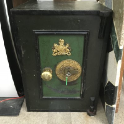 A vintage Phillips and sons safe with key. 60 x 38 x 43 cm