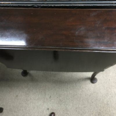 A mahogany drop leaf table. 66cm wide