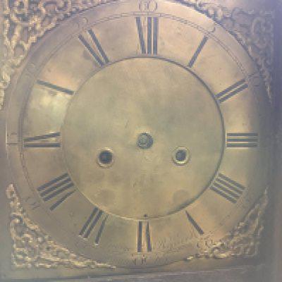 A oak long case clock the brass dial with Roman numerals no reserve.