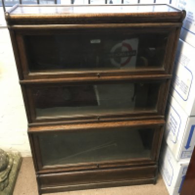 A globe wernicke three section bookcase. 86 cm wide 124 cm tall.