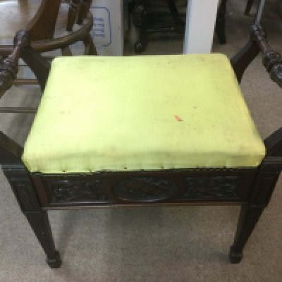 An Edwardian music stool. Shipping category D.