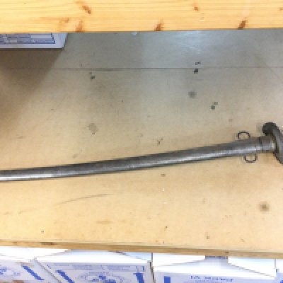 A British Victorian 1885 Pattern cavalry sword with scabbard , the sword has a curved blade and a basket hilt with a pierced Maltese Cross symbol .blade 88cm long total length 102cm. This lot cannot be posted