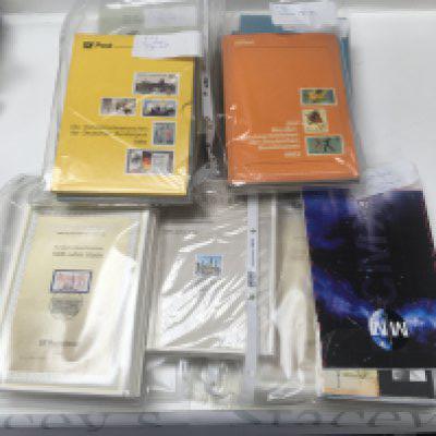 A box containing 1991-1995 German stamps, also including year books 1992-1995 86-89 and 80-83. And first day cover 1992,93,94,95 1991-1994. All in great condition.